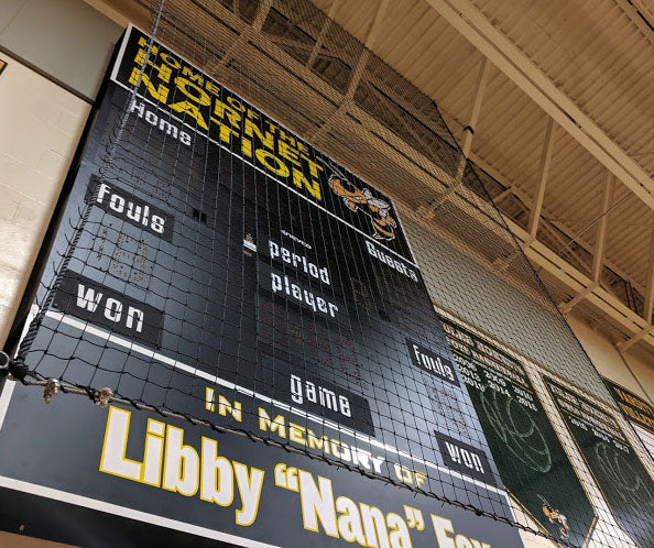 A sign in front of a building that reads " in memory of libby nana fox."